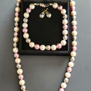 Pearl jewelry necklace bracelet and earrings